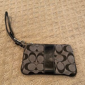 Small black fabric logo wristlet